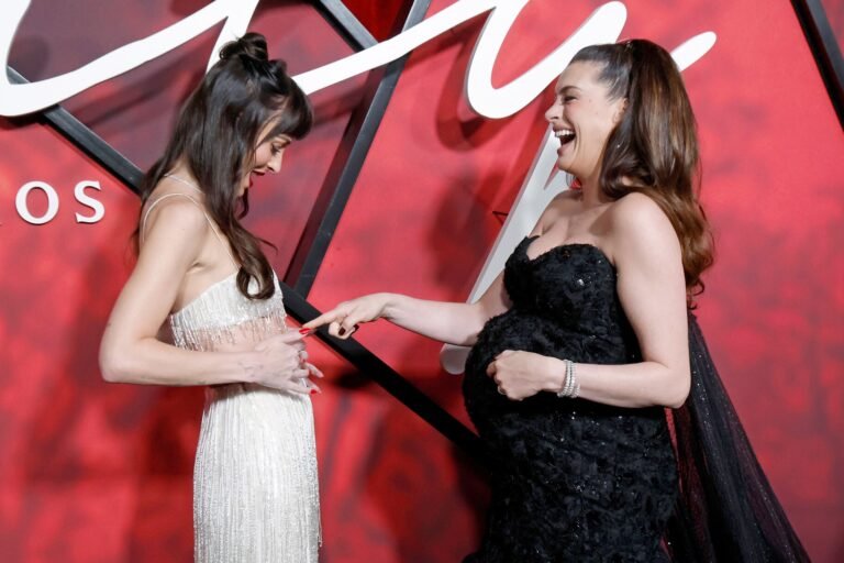 Anne Hathaway reacts to her viral Verity red carpet moment